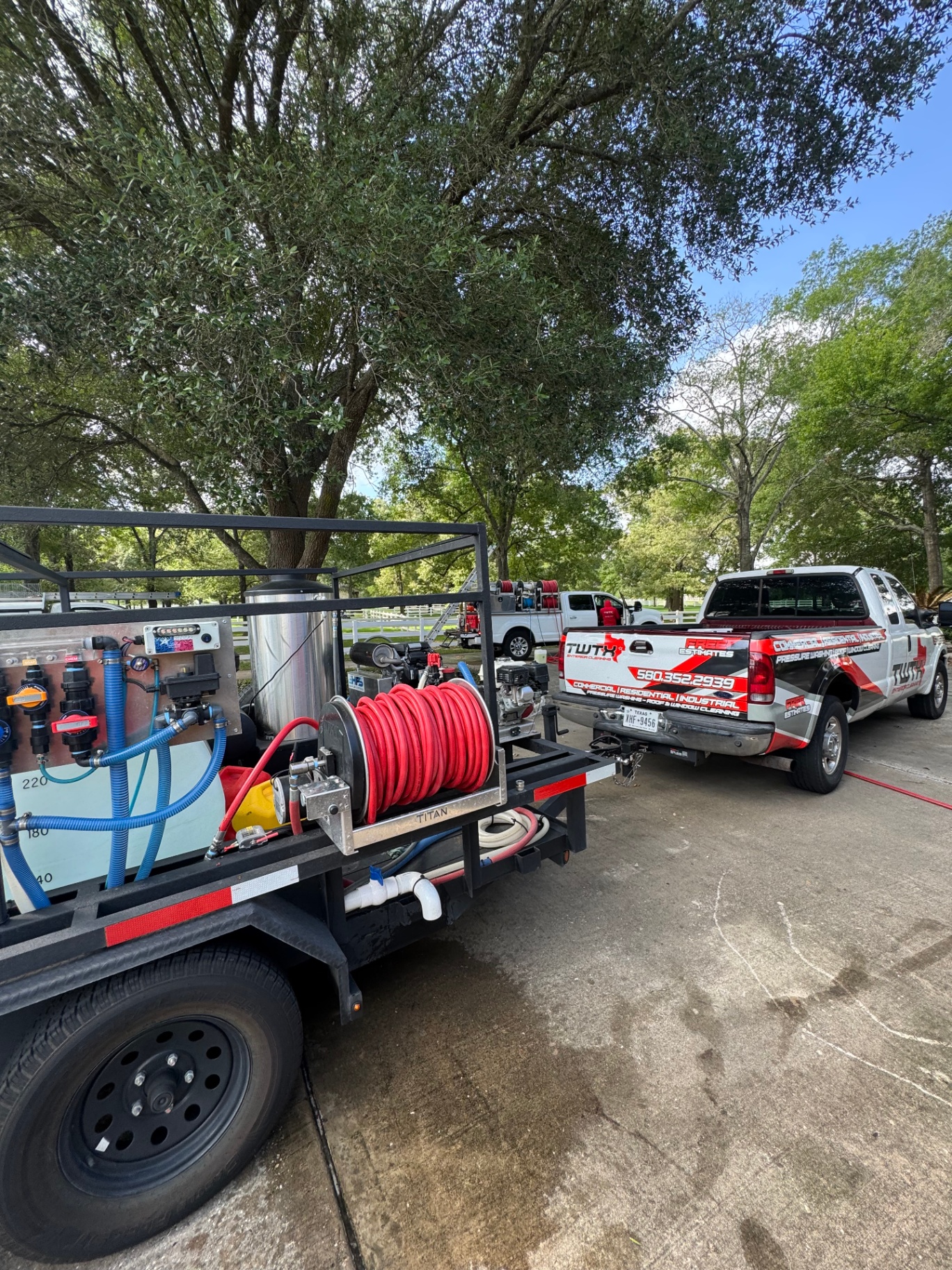 Amazing Power Wash service rig and truck set up on site